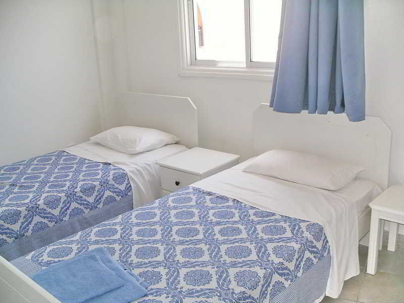 Renos Apartments Polis Esterno foto